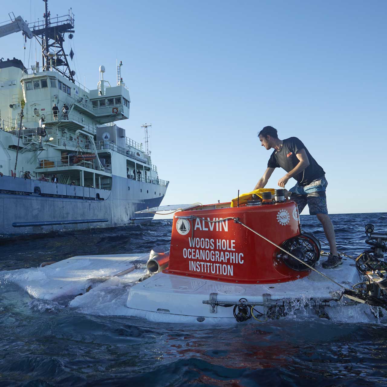 An Alvin team member prepares the sub for recovery after its 5000th dive in November 2018. (Photo by Drew Beweley, ©Woods Hole Oceanographic Institution)