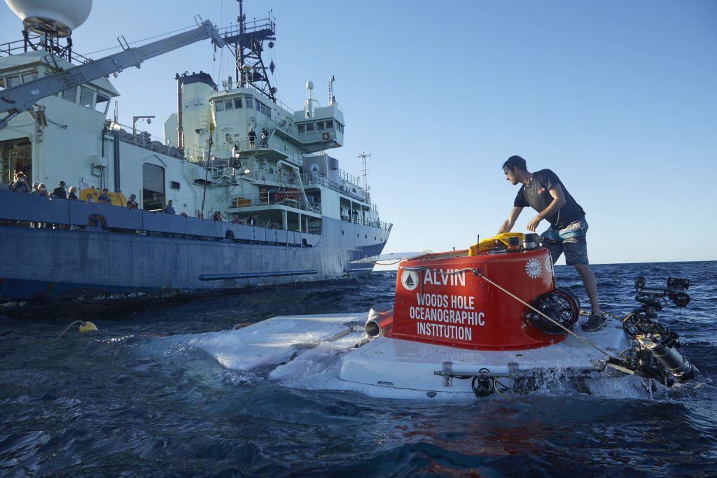 An Alvin team member prepares the sub for recovery after its 5000th dive in November 2018. (Photo by Drew Beweley, ©Woods Hole Oceanographic Institution)