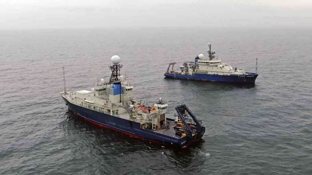 Aerial view of R/V Atlantis and R/V Neil Armstrong at sea together. Photo by Kent Sheasley © Woods Hole Oceanographic Institution