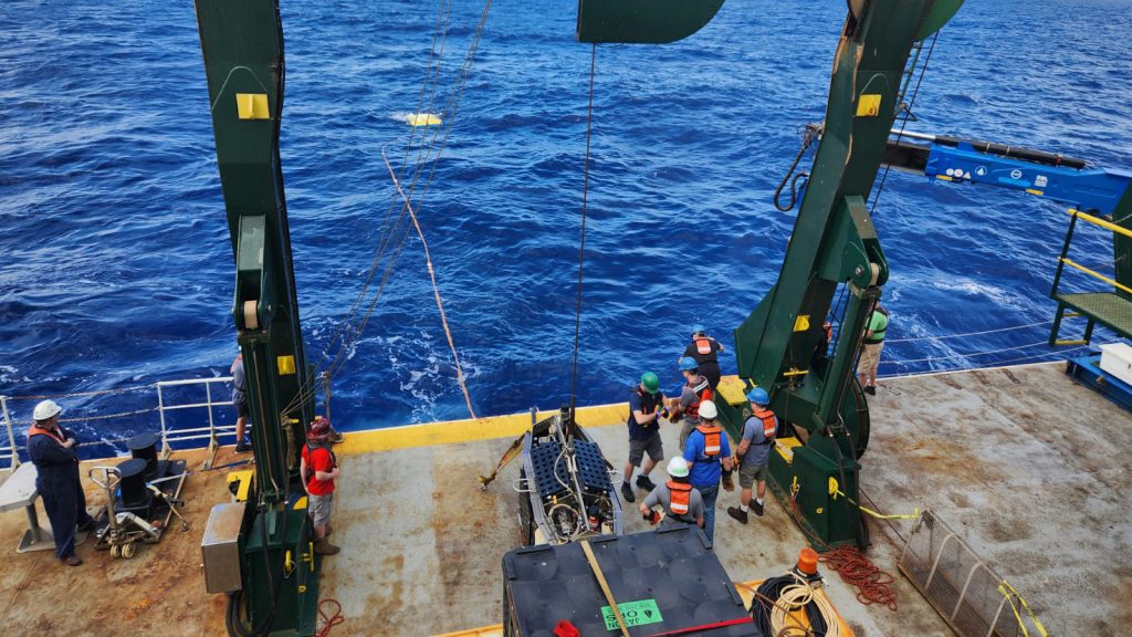 The successful recovery of Medea after a ship-wide power outage. Jason, which can be seen floating at the end of the tether cable, was recovered shortly after. Photo by Zachary Clayton.