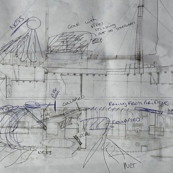 Notes on the plan of Quest based on observations by the remotely operated vehicle help guide Alvin pilots over the wreck on the seafloor. (Photo by Ken Kostel, © Woods Hole Oceanographic Institution)