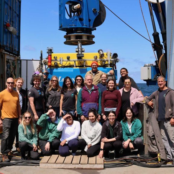 The PROTATAX23 Science Team and members of the Jason Team on deck of R/V Thomas Thompson. (Photo by Thompson AB Elena Wisecarver, ©Woods Hole Oceanographic Institution)